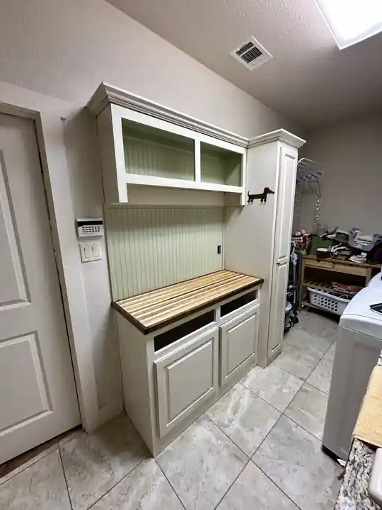 Painted mudroom built-ins with a bench